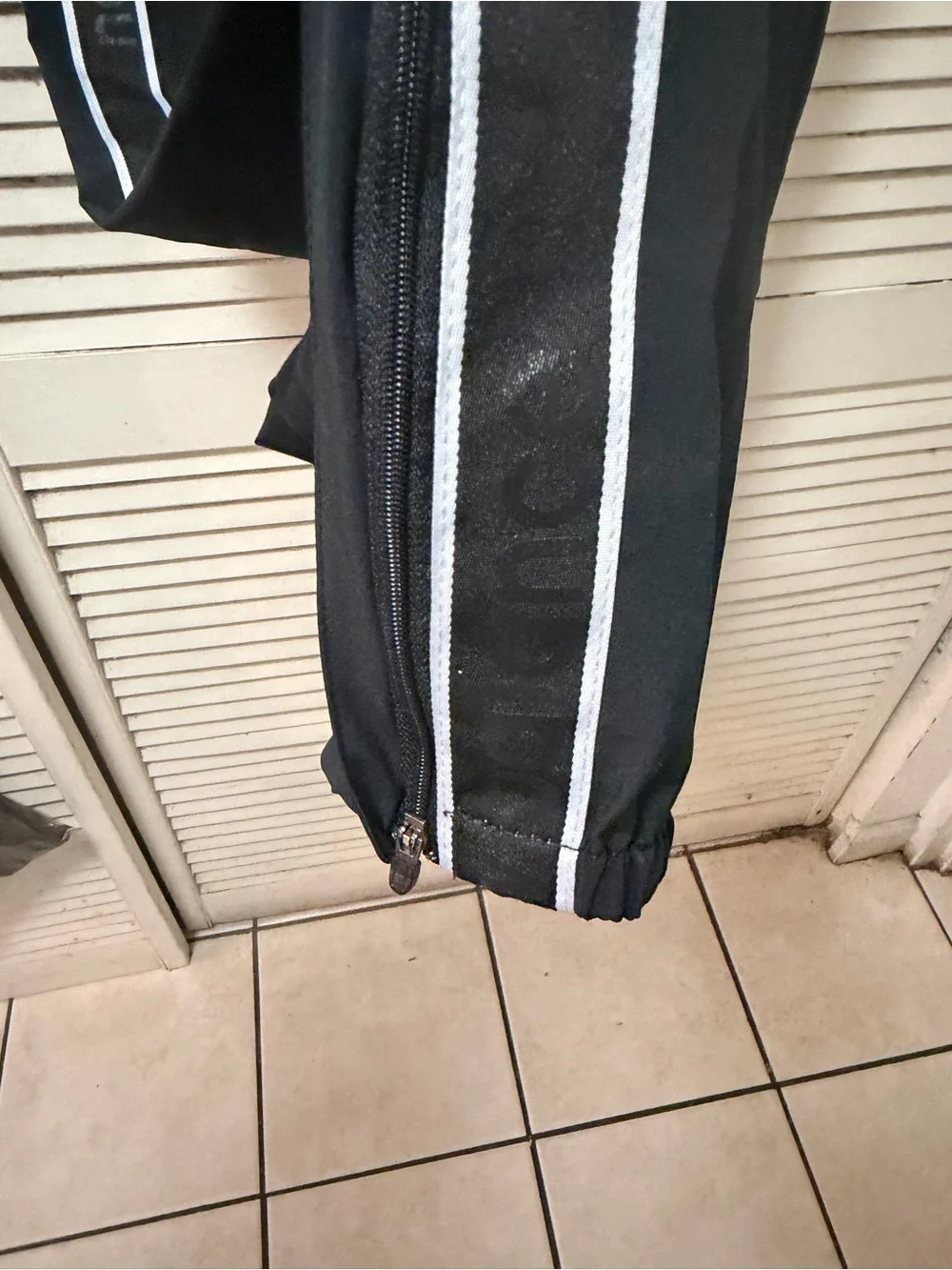 New Balance mens Black Athletic Track Pants